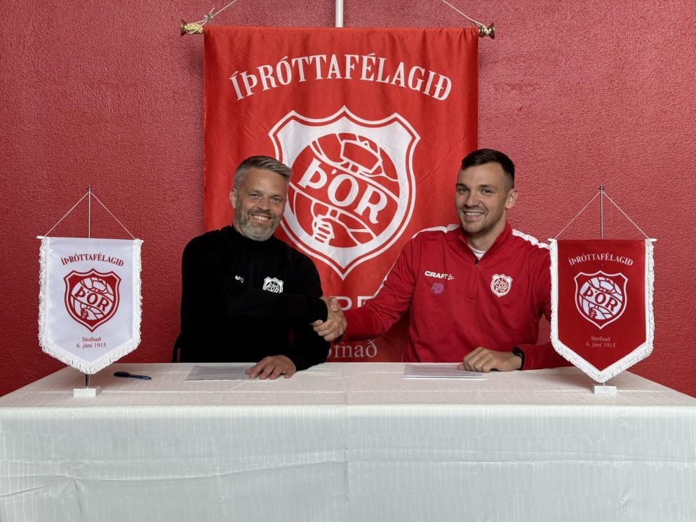 Samningurinn handsalaður